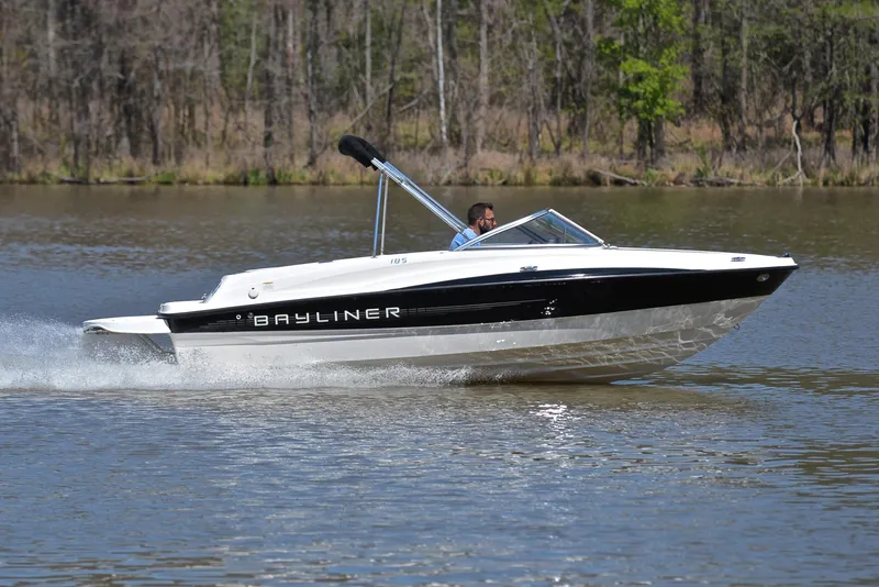 Slide: The Image of 2013 Bayliner 185 speedboat cruising on a lake. - 3