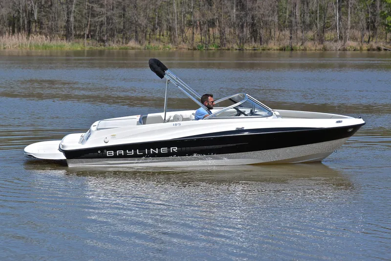 Slide: The Image of 2013 Bayliner 185 boat cruising on a calm lake. - 7