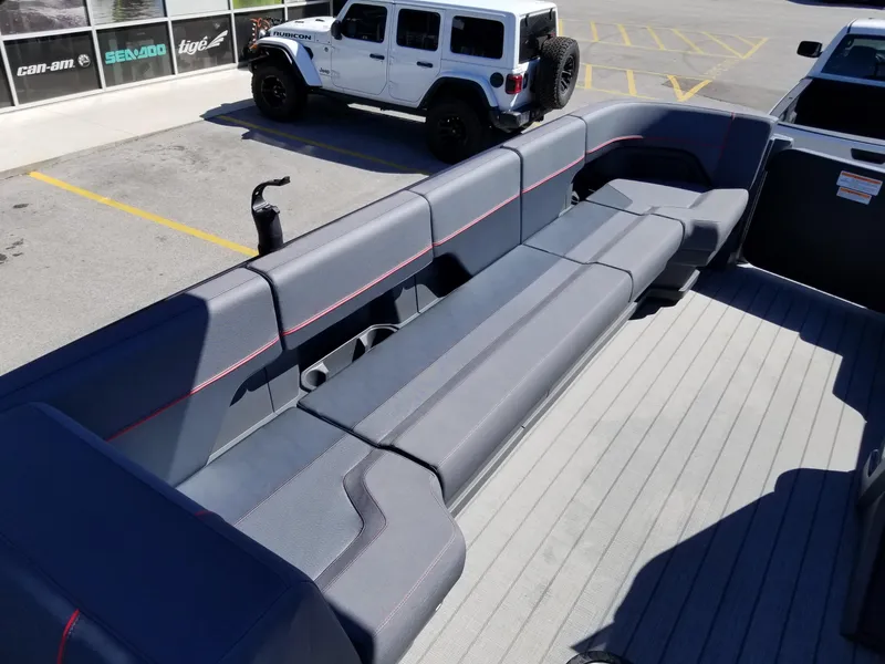 Slide: The Image of 2024 Manitou Explorer 22 Max Bench interior seating area. - 12