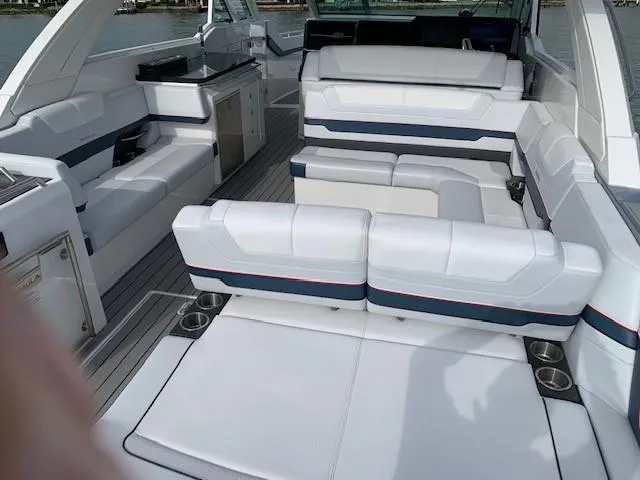 Slide: The Image of 2021 Formula 380 Super Sport Crossover OB interior with luxurious seating and modern amenities. - 10
