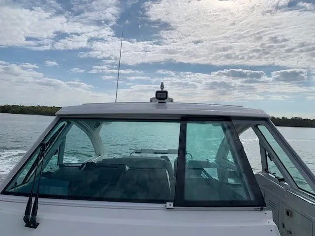 Slide: The Image of 2021 Formula 380 Super Sport Crossover OB on the water, rear view. - 14