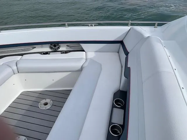 Slide: The Image of 2021 Formula 380 Super Sport Crossover OB boat interior seating area. - 16