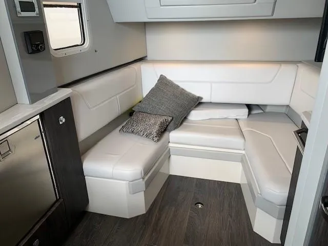 Slide: The Image of Interior of 2021 Formula 380 Super Sport Crossover OB with modern seating and cushions. - 18