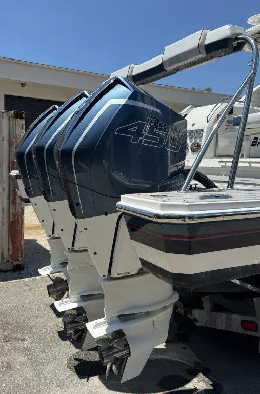 Slide: The Image of 2021 Formula 380 Super Sport Crossover OB with triple 450 horsepower outboard engines. - 23