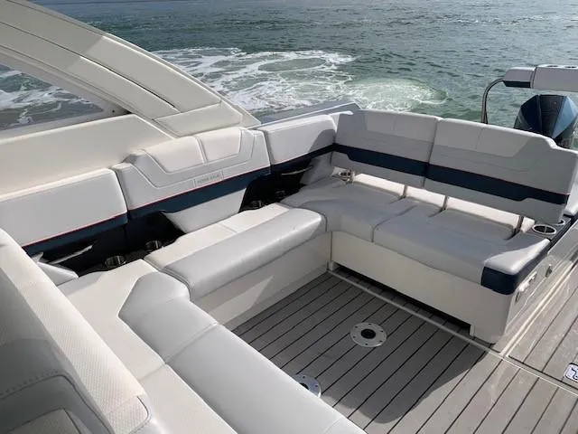 Slide: The Image of 2021 Formula 380 Super Sport Crossover OB boat interior with luxurious seating. - 8