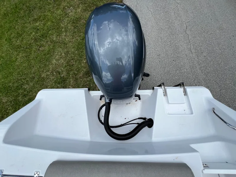 Slide: The Image of 2023 Sportsman Open 212 Platinum boat with outboard motor, top view. - 25