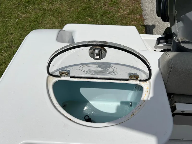 Slide: The Image of 2023 Sportsman Open 212 Platinum boat livewell with open lid. - 26