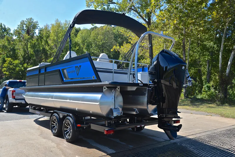 Slide: The Image of 2023 Viaggio D23S Platinum pontoon boat on trailer at boat launch. - 12