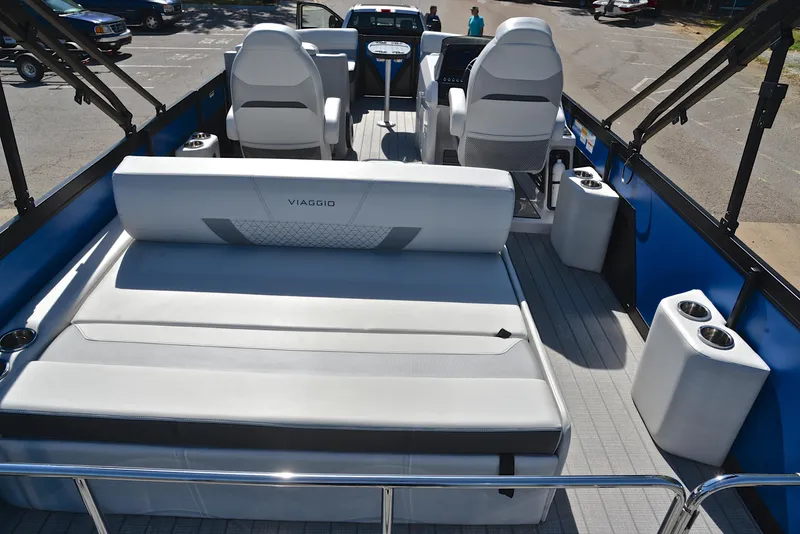 Slide: The Image of 2023 Viaggio D23S Platinum pontoon boat interior with luxurious seating and modern design. - 18