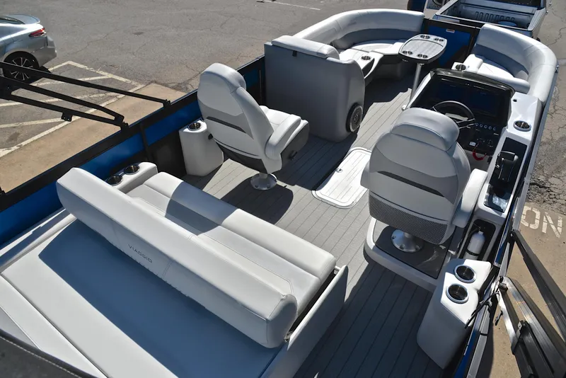 Slide: The Image of 2023 Viaggio D23S Platinum pontoon boat interior with luxurious seating and modern design. - 19