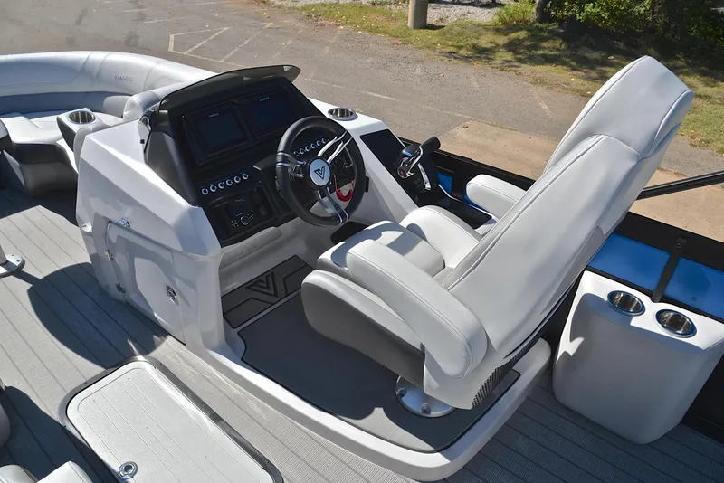 Slide: The Image of 2023 Viaggio D23S Platinum boat cockpit with modern controls and comfortable seating. - 27