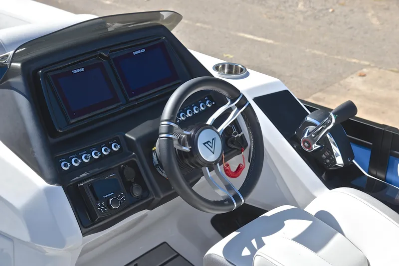 Slide: The Image of 2023 Viaggio D23S Platinum boat dashboard with dual screens and modern controls. - 29