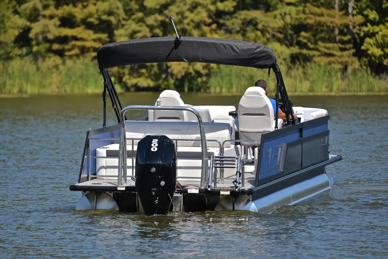 Slide: The Image of 2023 Viaggio D23S Platinum pontoon boat on a lake. - 7