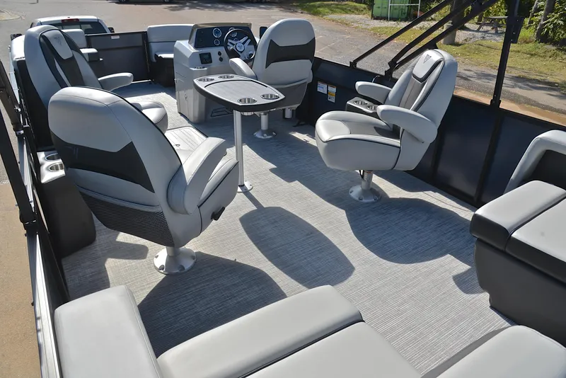 Slide: The Image of Interior of 2023 Viaggio L22Q pontoon boat with luxurious seating and modern dashboard. - 20