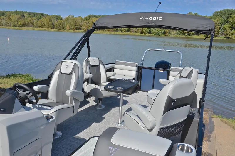 Slide: The Image of 2023 Viaggio L22Q pontoon boat with luxurious seating on a serene lake. - 21