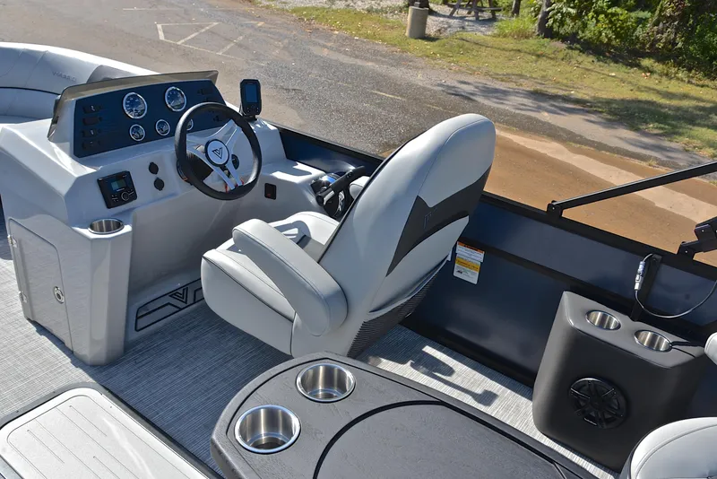 Slide: The Image of 2023 Viaggio L22Q boat interior with captain's chair and control console. - 24