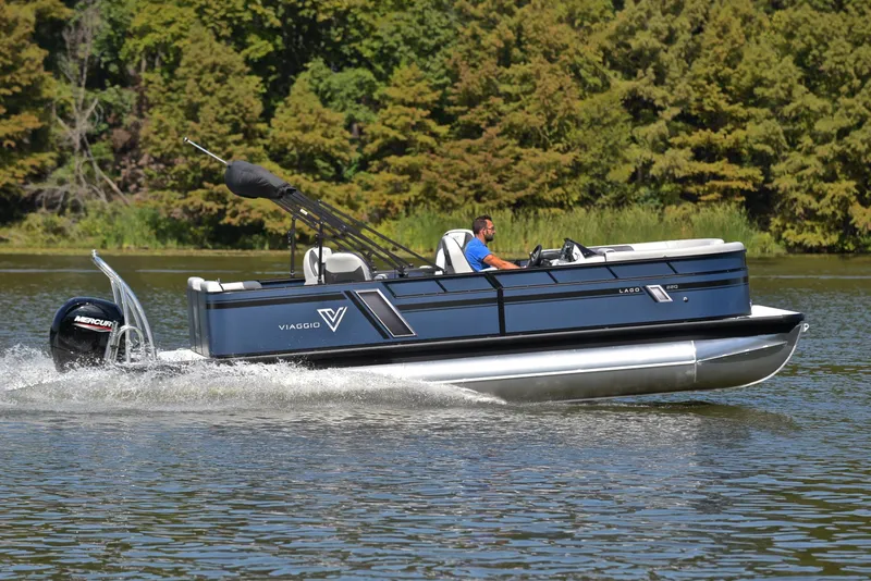 Slide: The Image of 2023 Viaggio L22Q pontoon boat cruising on a lake. - 3