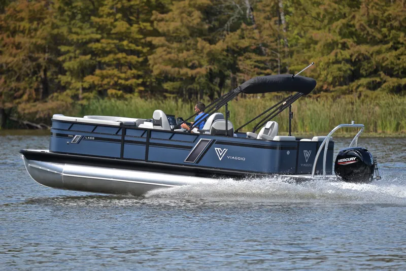 Slide: The Image of 2023 Viaggio L22Q pontoon boat cruising on a lake. - 4