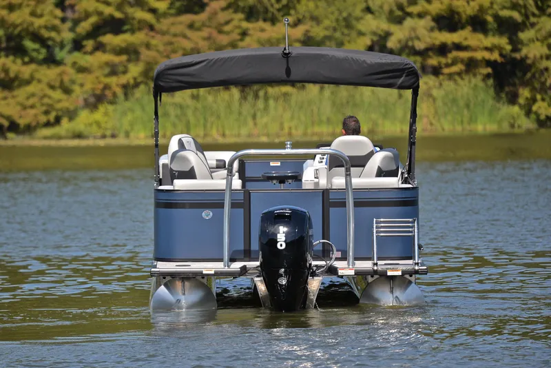 Slide: The Image of 2023 Viaggio L22Q pontoon boat on a serene lake. - 7