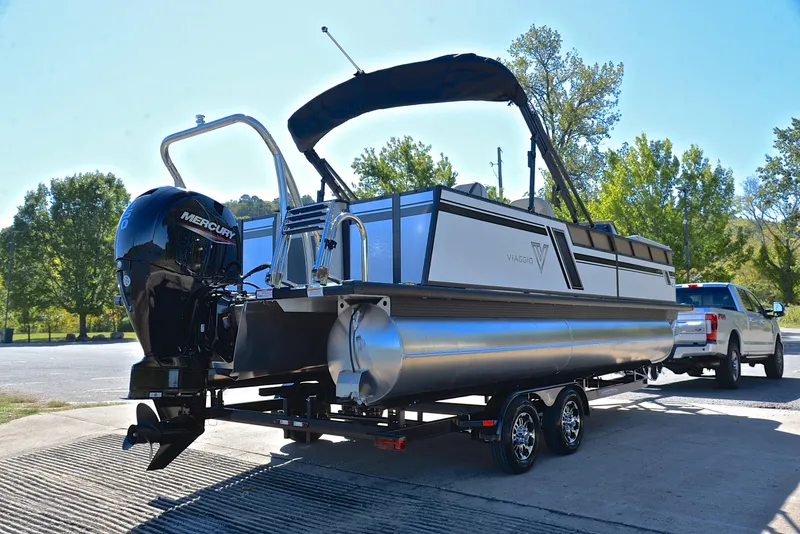 Slide: The Image of 2023 Viaggio L22R pontoon boat on trailer with Mercury outboard motor. - 14