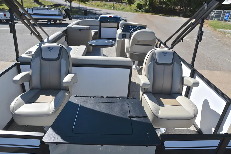 Slide: The Image of 2023 Viaggio L22R pontoon boat interior with seating and table. - 18