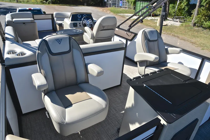 Slide: The Image of 2023 Viaggio L22R boat interior with luxurious seating and modern dashboard. - 24