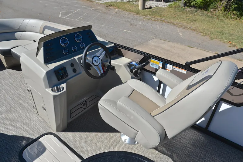 Slide: The Image of 2023 Viaggio L22R boat cockpit with steering wheel and captain's chair. - 25