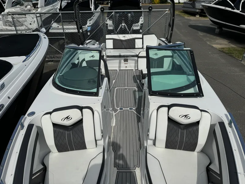 Slide: The Image of 2018 Monterey 278 Super Sport boat with dual windshields and luxurious seating. - 10