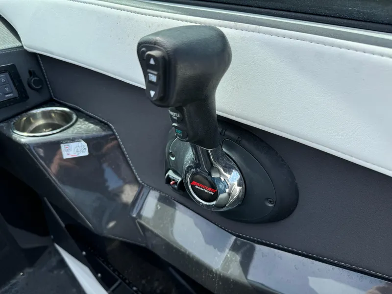 Slide: The Image of Close-up of the throttle control in a 2018 Monterey 278 Super Sport boat. - 11