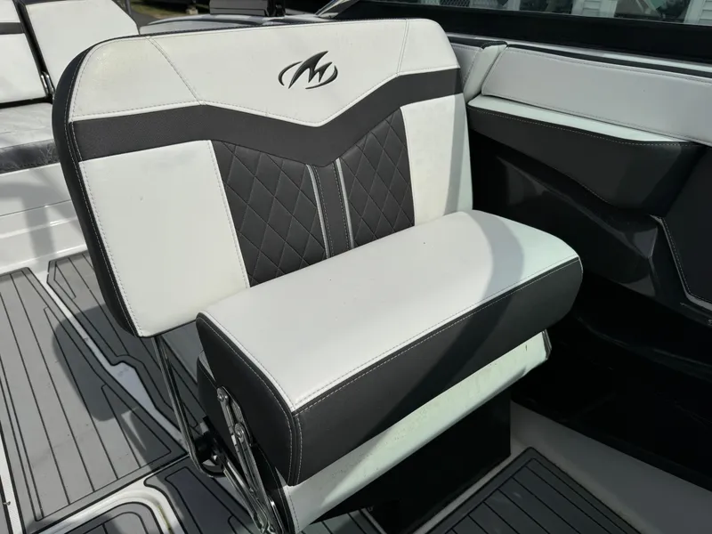 Slide: The Image of 2018 Monterey 278 Super Sport boat seat with black and white upholstery. - 13