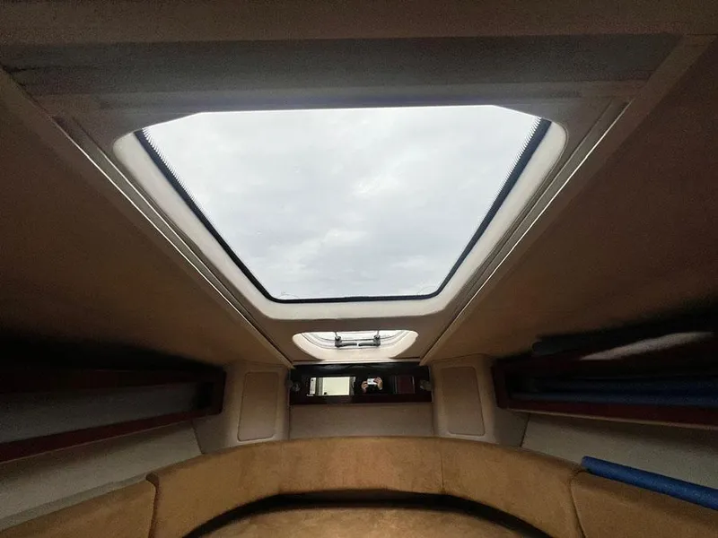 Slide: The Image of Interior cabin of 2010 Sea Ray 280 Sundancer with skylight. - 17