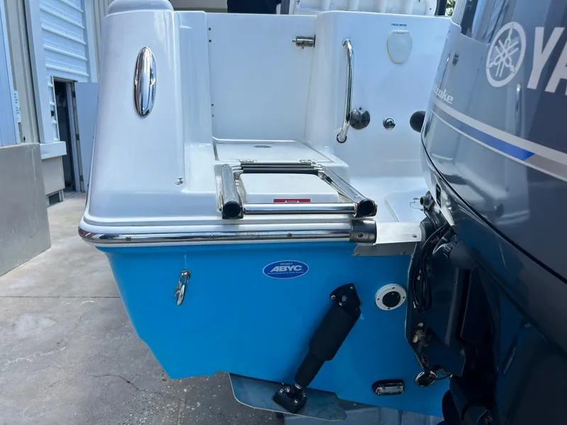Slide: The Image of 2016 Tidewater 252 CC Adventure boat stern with Yamaha outboard motor. - 10