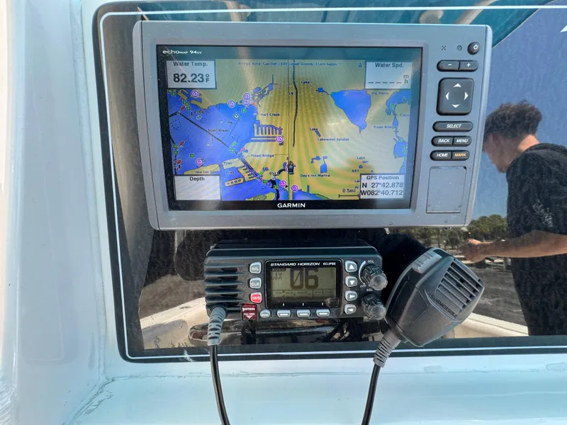 Slide: The Image of Garmin GPS and radio on 2016 Tidewater 252 CC Adventure boat. - 17
