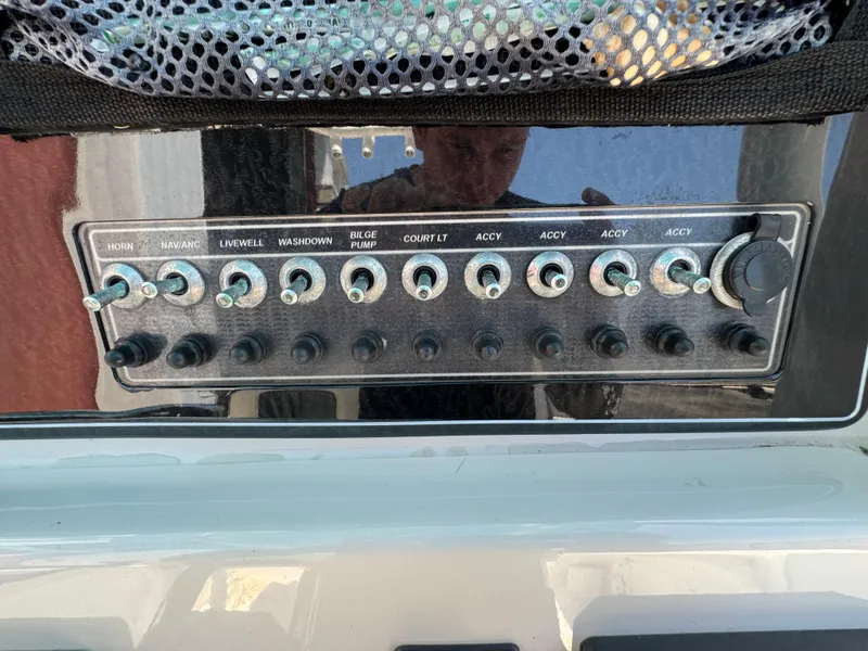 Slide: The Image of Control panel of a 2016 Tidewater 252 CC Adventure boat. - 18