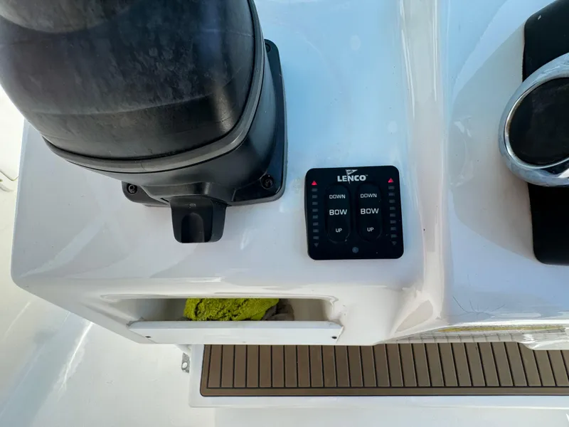 Slide: The Image of Control panel on a 2016 Tidewater 252 CC Adventure boat. - 20