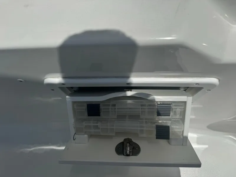 Slide: The Image of Tidewater 252 CC Adventure 2016 boat storage compartment. - 32