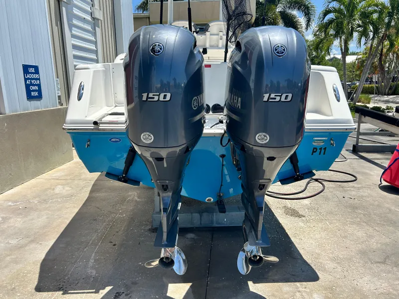 Slide: The Image of 2016 Tidewater 252 CC Adventure with twin Yamaha 150 outboard engines. - 8