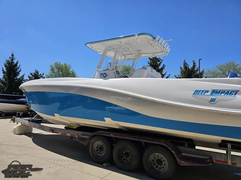 Slide: The Image of 2014 Deep Impact 36 Open boat on a trailer, side view. - 13