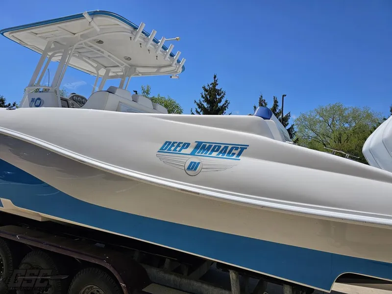 Slide: The Image of 2014 Deep Impact 36 Open boat on trailer, side view. - 14