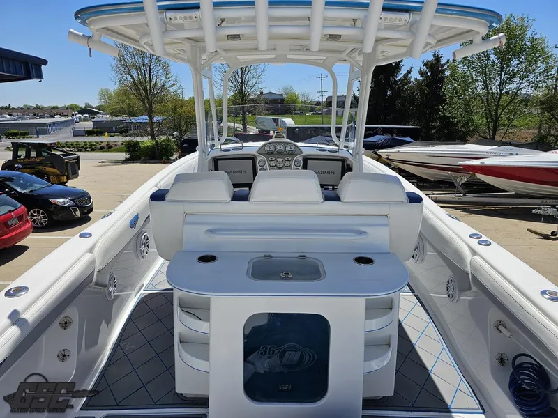 Slide: The Image of 2014 Deep Impact 36 Open boat interior with helm station and seating. - 20