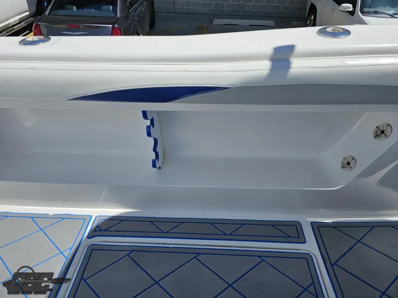 Slide: The Image of 2014 Deep Impact 36 Open boat interior with blue and white detailing. - 27