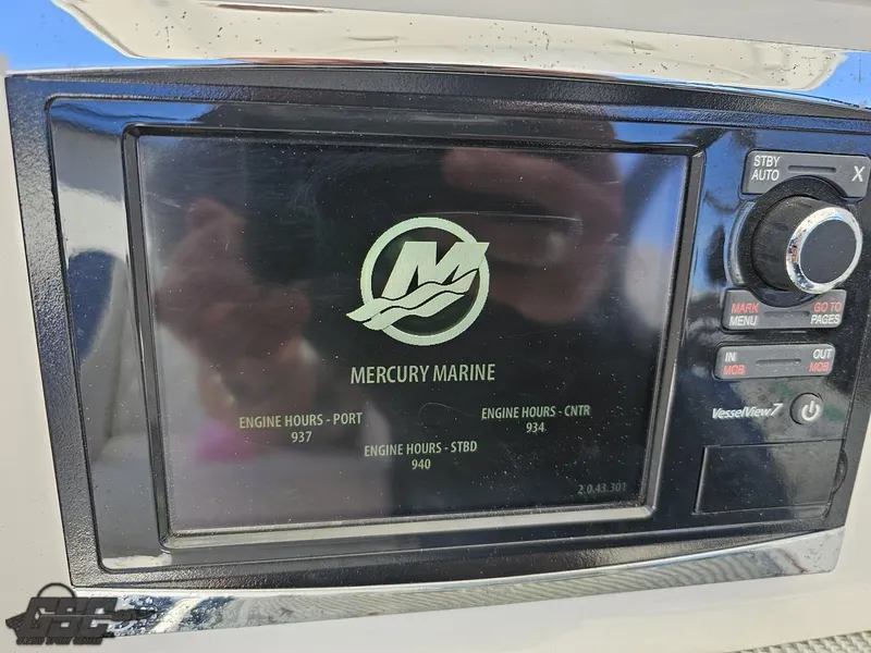 Slide: The Image of Mercury Marine engine hours display on 2014 Deep Impact 36 Open boat. - 36