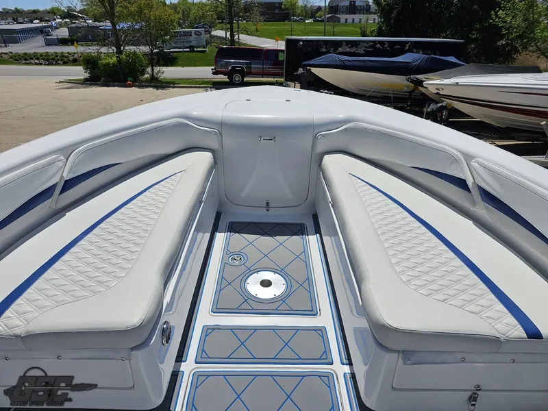 Slide: The Image of 2014 Deep Impact 36 Open boat with white and blue cushioned seating. - 45