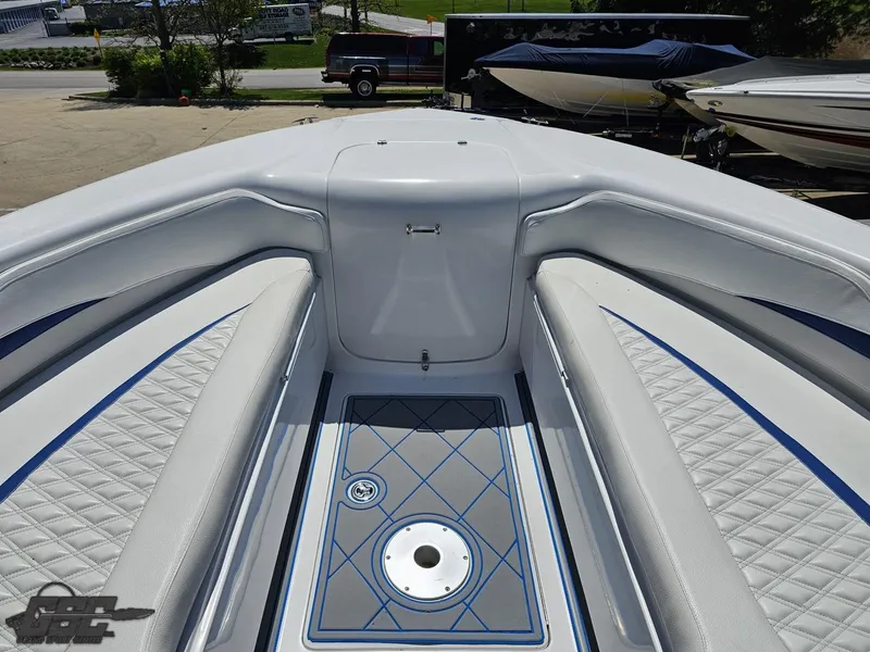 Slide: The Image of 2014 Deep Impact 36 Open boat bow with cushioned seating and storage. - 46