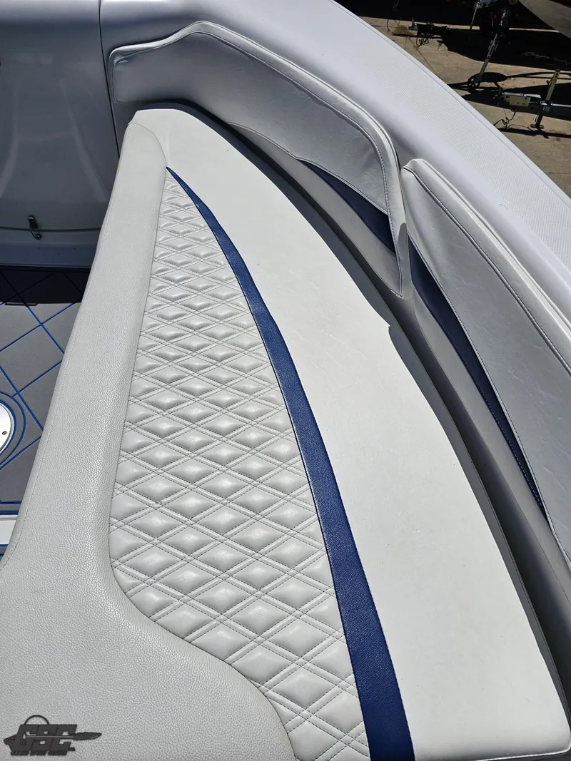 Slide: The Image of 2014 Deep Impact 36 Open boat with diamond-stitched white and blue upholstery. - 48
