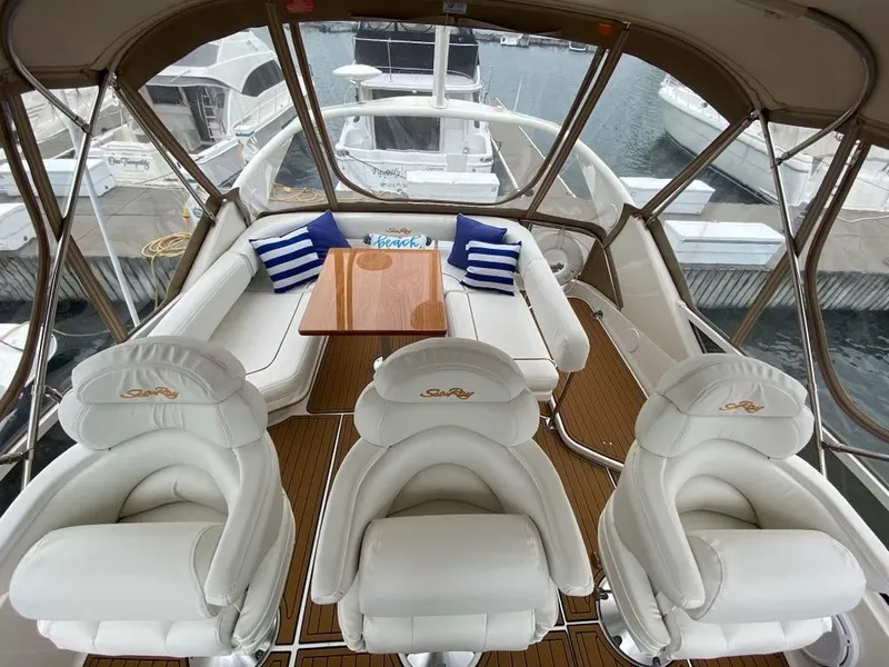 Slide: The Image of Luxurious 2000 Sea Ray 400 Sedan Bridge yacht interior with plush seating and elegant design. - 7