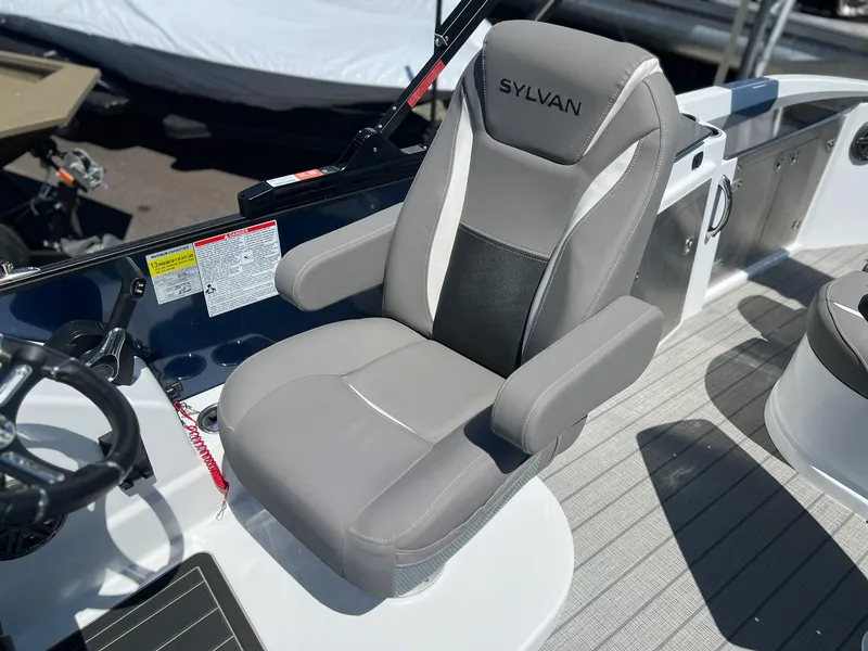 Slide: The Image of 2024 Sylvan S3 CLZ DH Tritoon captain's chair and helm station. - 13