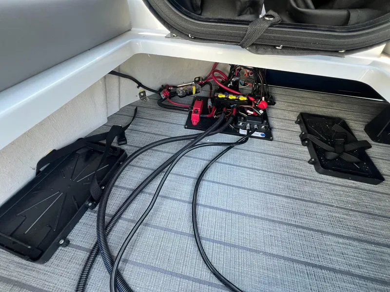 Slide: The Image of 2024 Sylvan S3 CLZ DH Tritoon interior wiring and battery setup. - 16