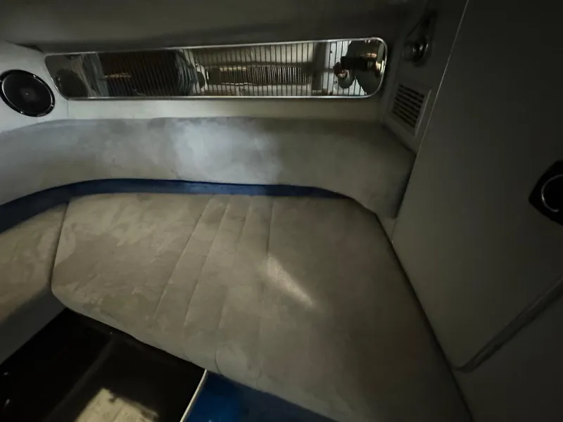 Slide: The Image of Interior cabin of 1987 Sea Ray Pachanga 32 boat with cushioned seating. - 20