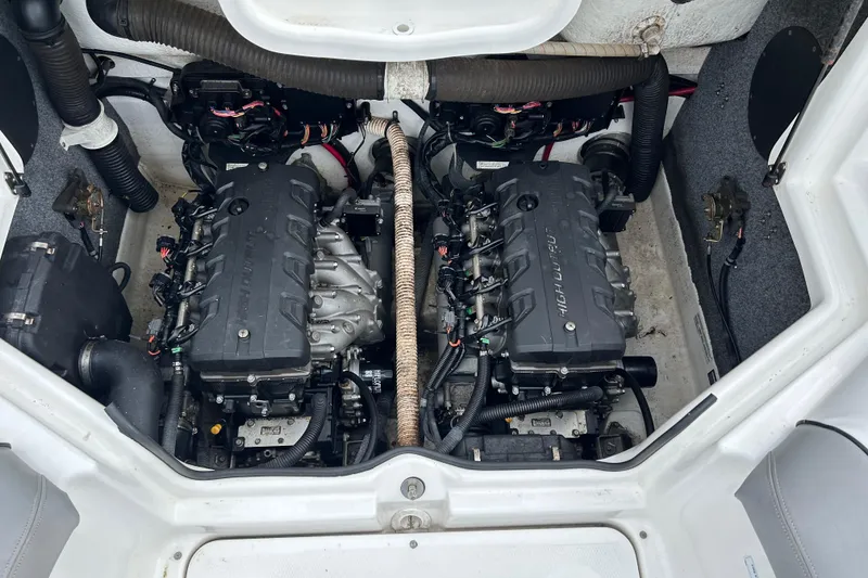 Slide: The Image of 2012 Yamaha Boats AR240 twin engines in engine compartment. - 10